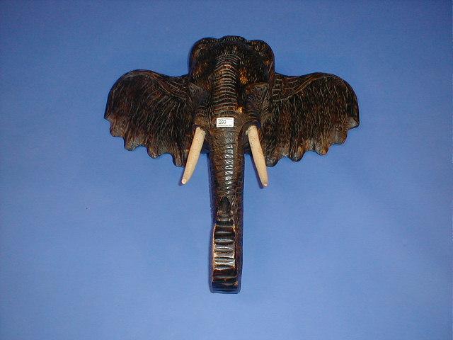 Appraisal: A carved hardwood elephant mask high