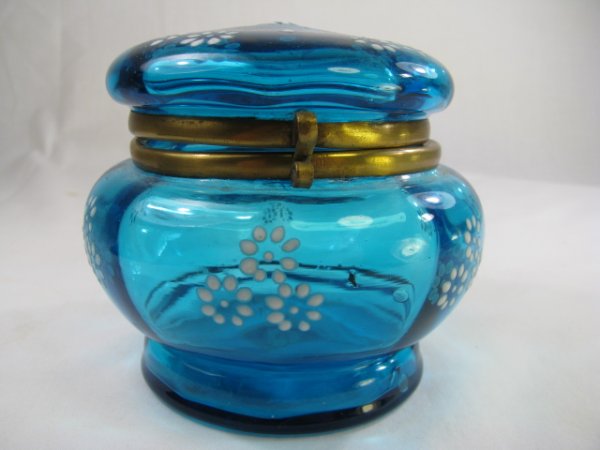 Appraisal: Antique blue glass powder jar with white enameled flowers and