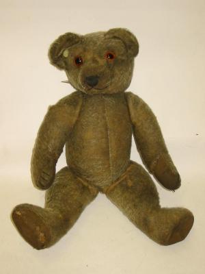 Appraisal: A Chad Valley teddy bear with gold plush amber eyes