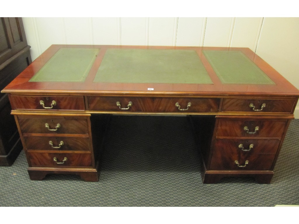 Appraisal: Reproduction twin pedestal kneehole desk with leather top