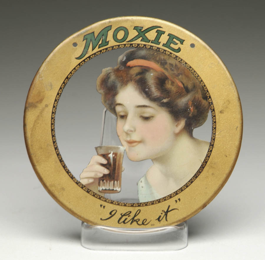 Appraisal: MOXIE TIN DIE CUT SIGN Round diecut tin sign with