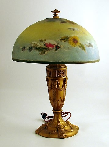 Appraisal: Domical shade with floral decoration on yellow and blue shaded