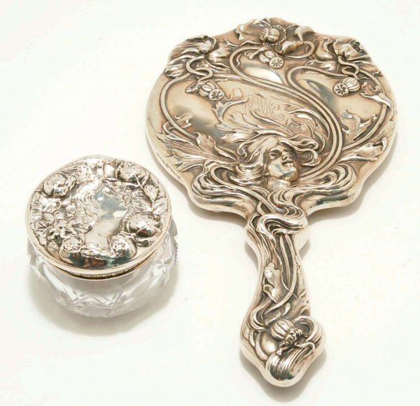 Appraisal: Sterling silver Art Nouveau hand mirror Lady's face surrounded by