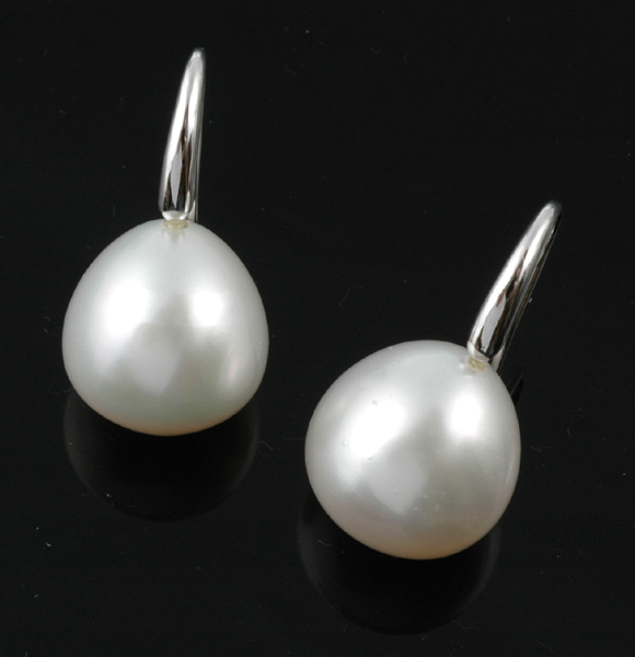 Appraisal: A pair of South Sea pearl drop earrings The white