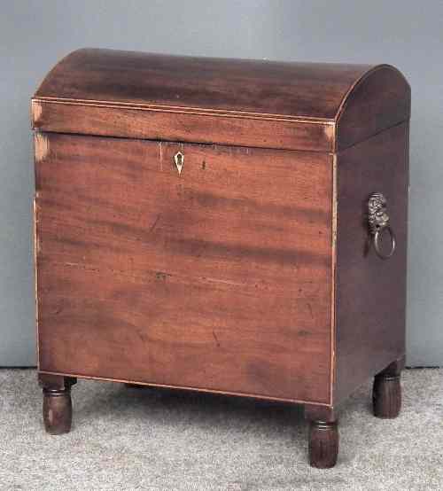 Appraisal: A George III mahogany domed top cellaret inlaid with boxwood