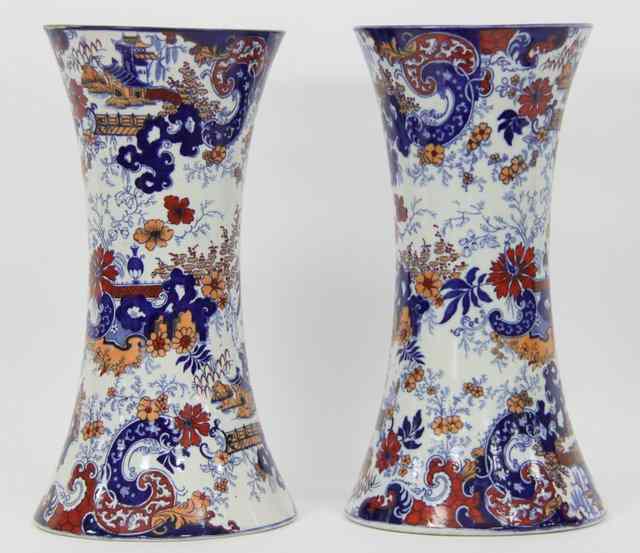 Appraisal: A pair of pottery vases circa of flared form decorated