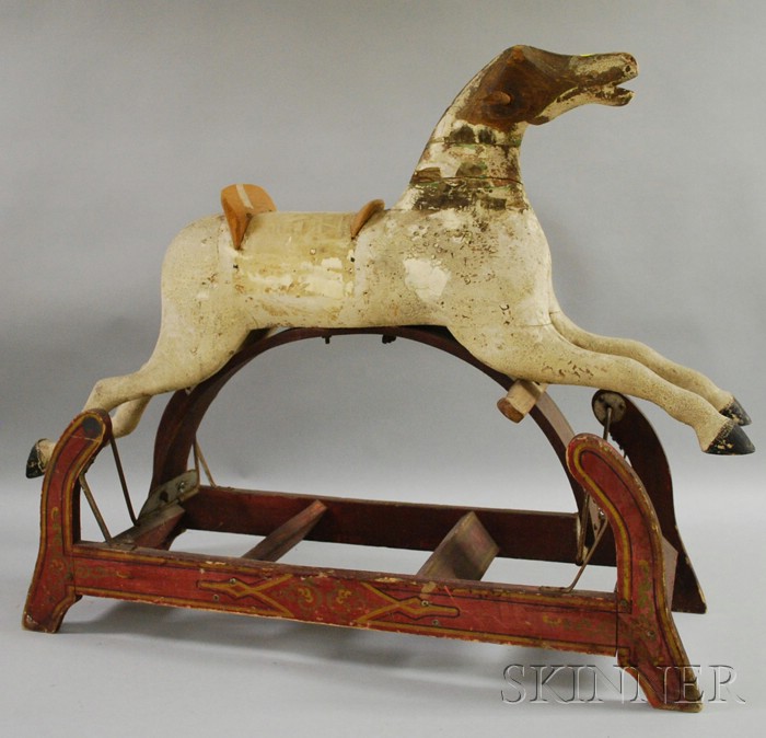 Appraisal: Polychrome Paint-decorated Carved Wood Gliding Horse th century restoration losses