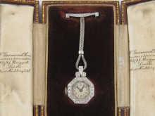 Appraisal: A platinum and diamond lady's fob watch on diamond bar