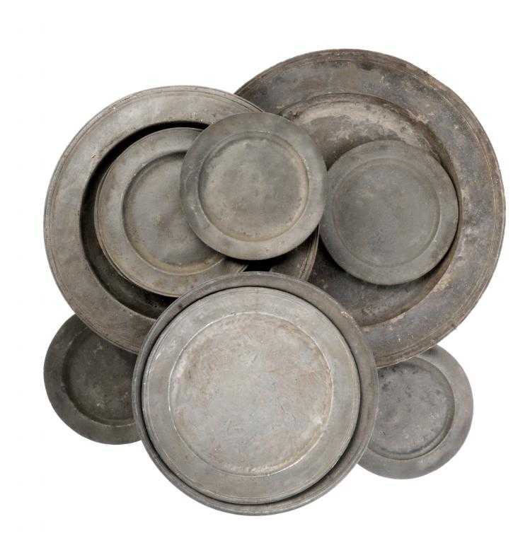 Appraisal: TWO ENGLISH PEWTER CHARGERS with reeded rim another and eight