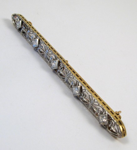 Appraisal: DIAMOND AND FOURTEEN KARAT GOLD PIN - in length and