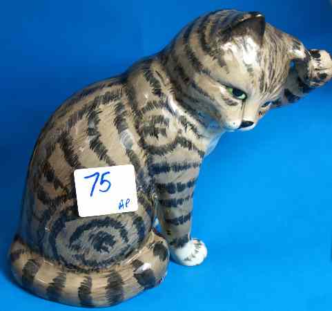 Appraisal: Beswick Seated Cat Scratching Ear in Grey Swiss Roll Decoration