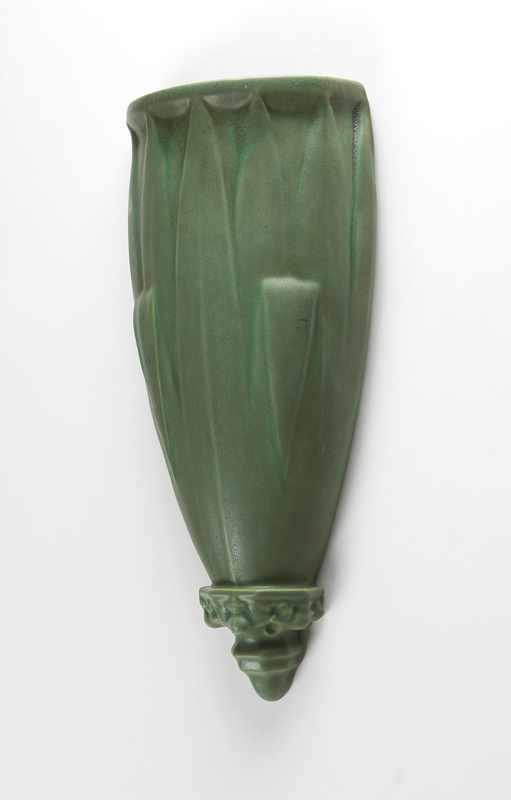 Appraisal: A Teco matte green glaze pottery wall pocket B First