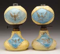 Appraisal: PAIR OF EAGLE MINI LAMPS S - WMG with embossed