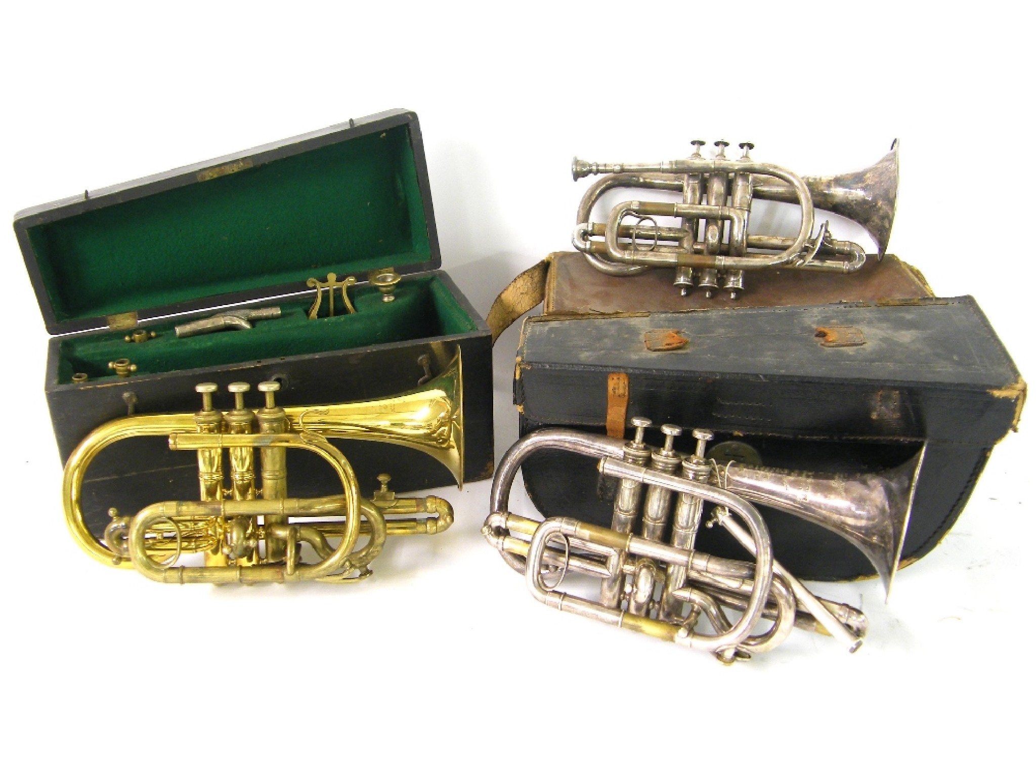 Appraisal: Joseph Wallis brass cornet with various attachments in a fitted