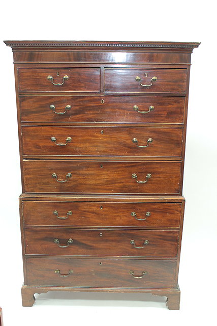 Appraisal: A TH CENTURY MAHOGANY CHEST-ON-CHEST OR TALLBOY with dentil carved