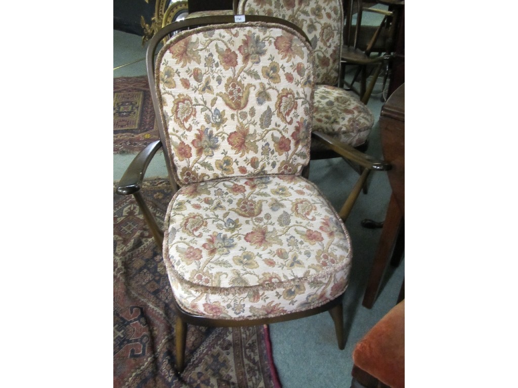 Appraisal: Pair of Ercol floral upholstered armchairs