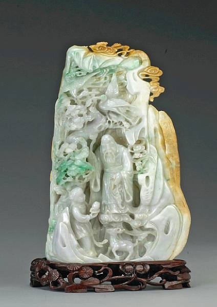 Appraisal: A pale greenish-white jadeite landscape boulder th Century Of thin