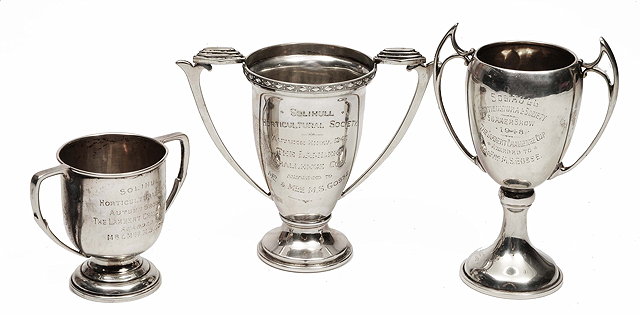 Appraisal: THREE MID TH CENTURY SILVER TROPHY CUPS each representing The