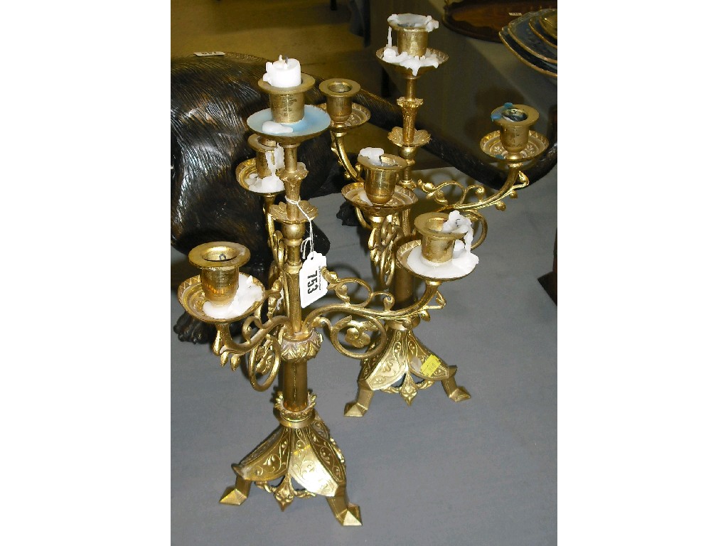 Appraisal: Pair of gilt metal Gothic style three branch candelabra both