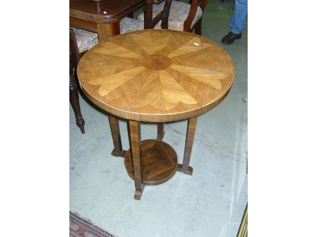 Appraisal: An Art Deco style walnut occasional table with circular top