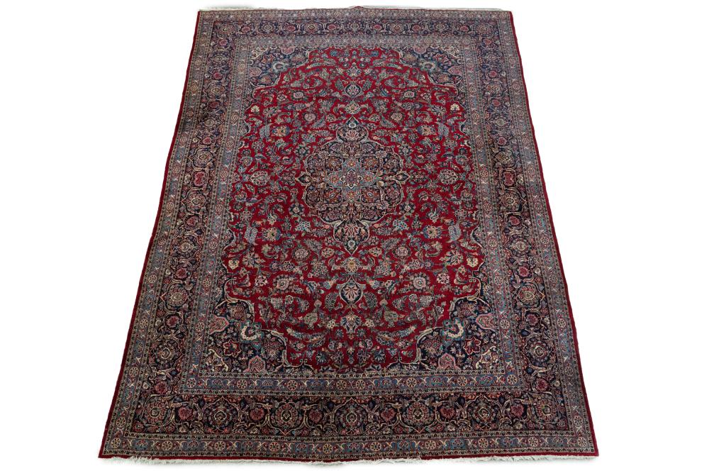 Appraisal: PERSIAN AREA RUG AREA RUGon a red and blue field