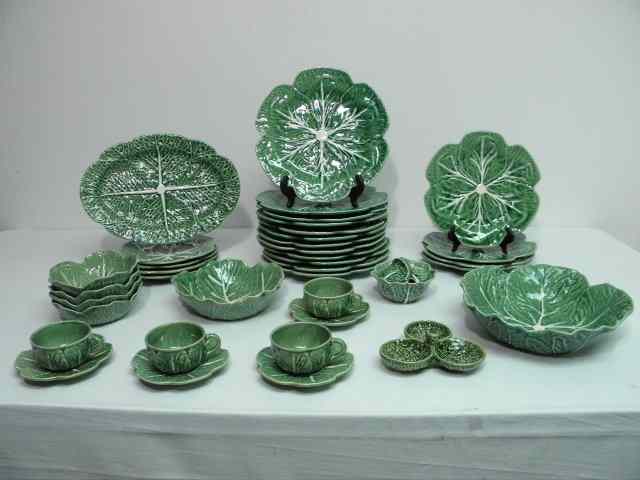 Appraisal: Bordallo Pinheiro partial dinnerware service in the ''Cabbage'' pattern total