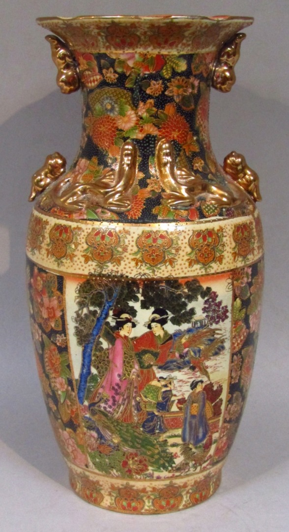 Appraisal: A thC oriental earthenware vase with a flared floral rim