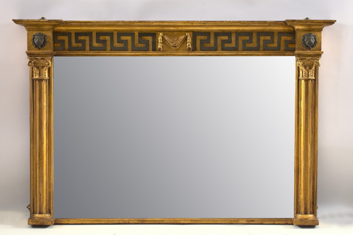 Appraisal: Imposing English Carved and Parcel-Ebonized Giltwood Overmantel Mirror in the