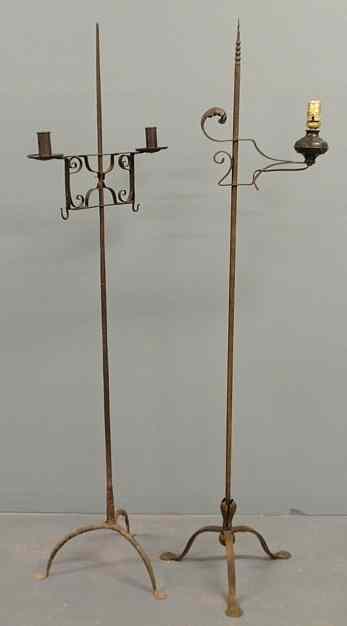 Appraisal: Two wrought iron standing floor lamps one electrified h