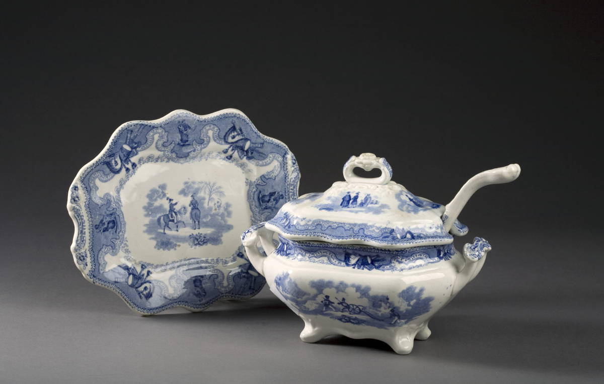 Appraisal: TEXIAN CAMPAIGNE STAFFORDSHIRE LIGHT-BLUE TRANSFER-PRINTED SAUCE TUREEN COVER AND STAND