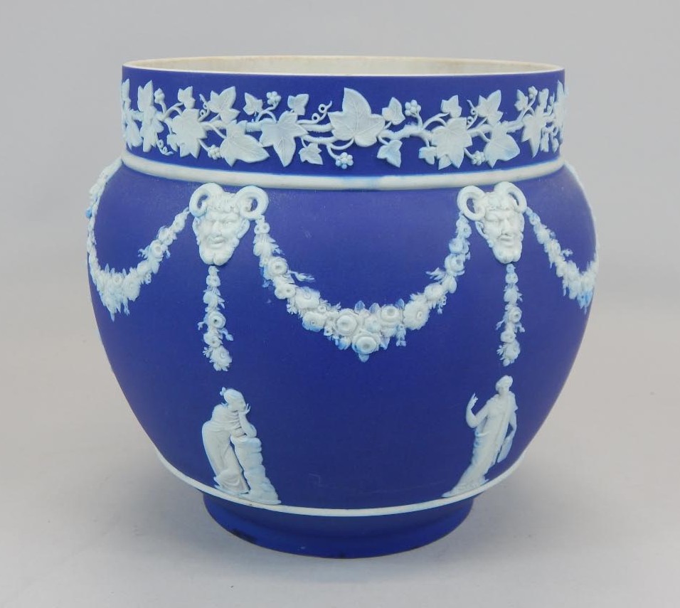 Appraisal: A Wedgwood dark blue Jasperware jardiniere decorated with Neo-classical type