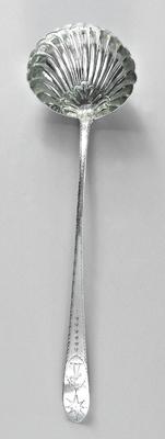 Appraisal: George III Irish silver ladle oval handle bright cut engraving