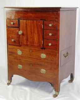 Appraisal: A Regency mahogany enclosed washstand with fitted interior and arrangement