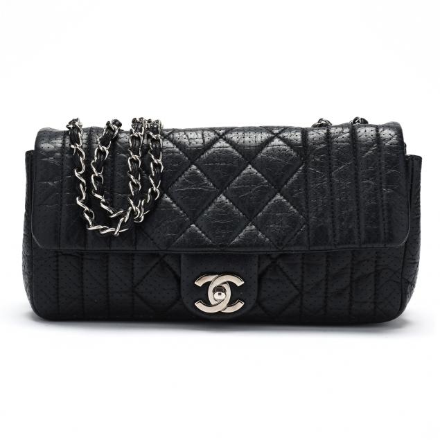 Appraisal: Aged Calfskin Perforated Flap Bag Chanel Made in France of