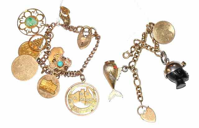 Appraisal: A CT GOLD BRACELET with nine attached gold charms with