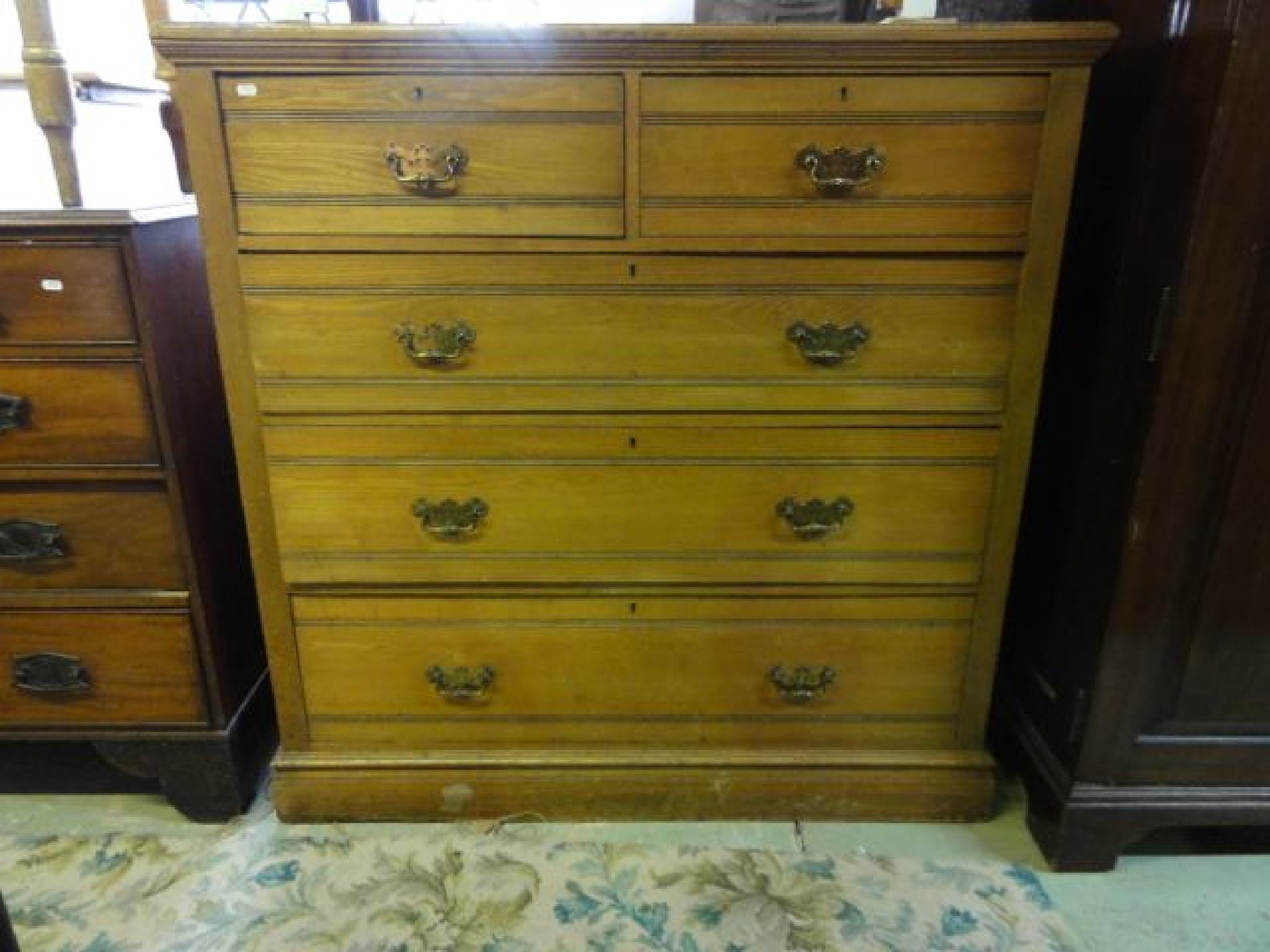 Appraisal: A large late Victorian ash bedroom chest of three long