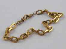 Appraisal: A yellow metal tests ct gold bracelet made from large