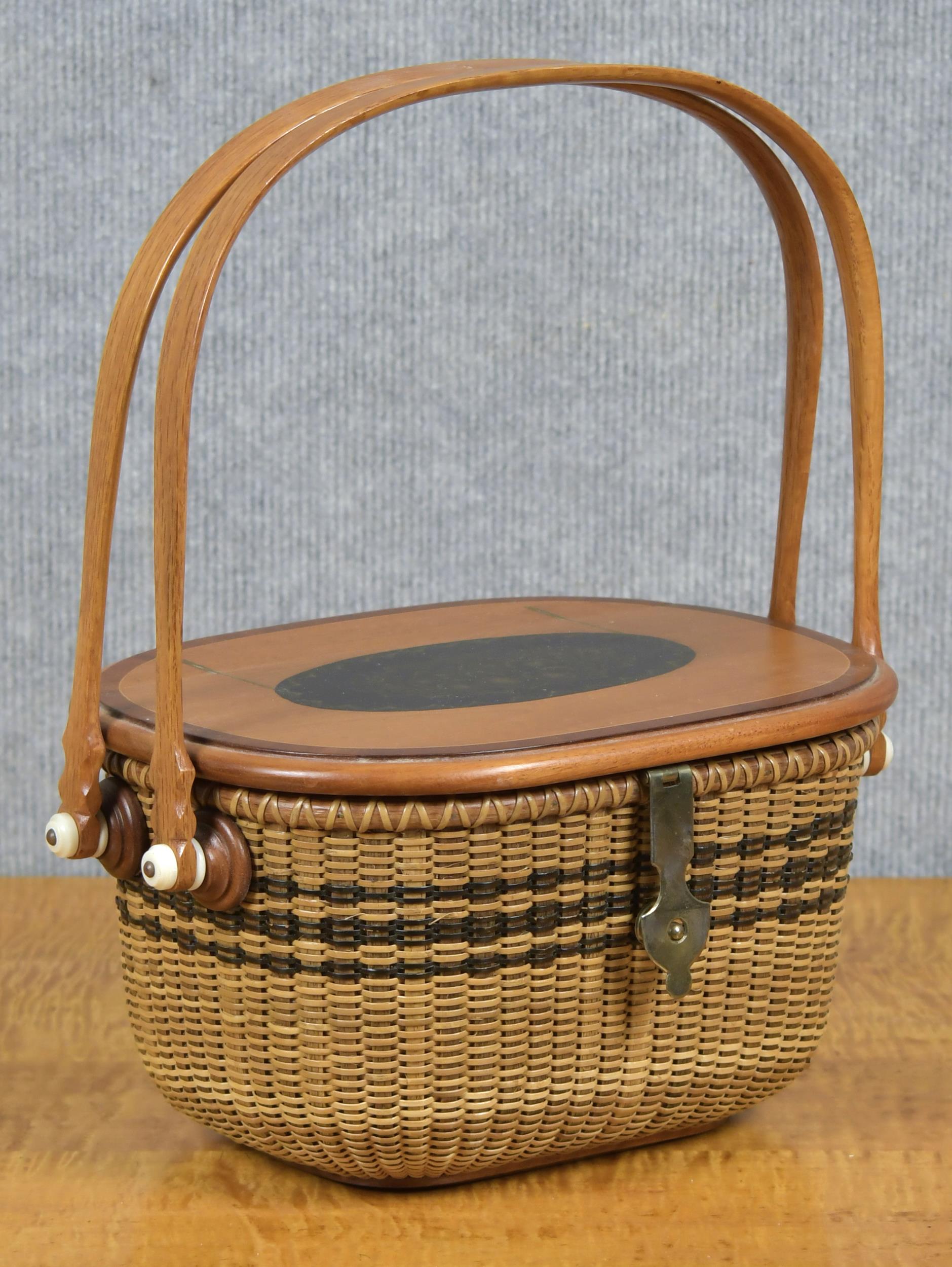 Appraisal: HARRY HILBERT DOUBLE HANDLE NANTUCKET BASKET An oval double swing