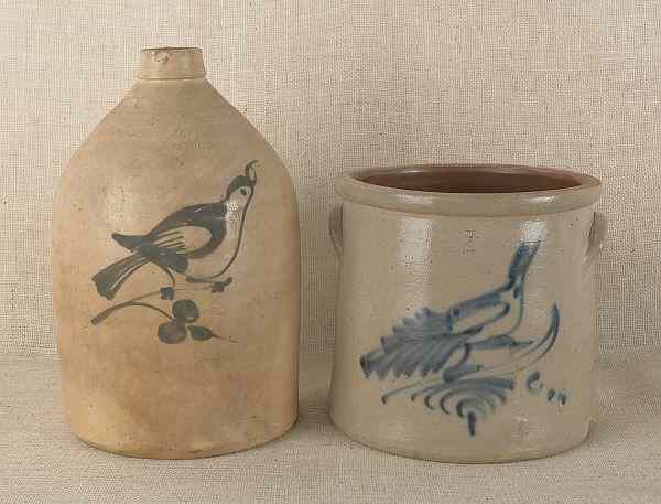 Appraisal: Stoneware jug and crock th c with cobalt bird decoration