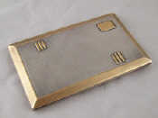 Appraisal: An Asprey slide action opening silver parcel gilt cigarette case