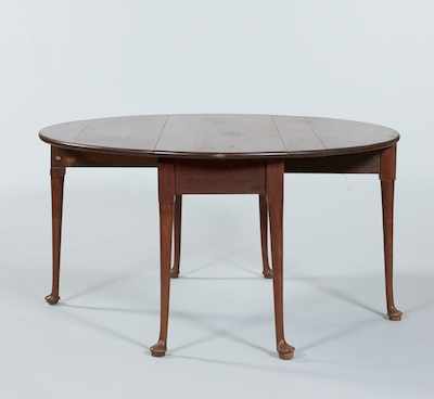 Appraisal: A Circular Gateleg Table With straight legs pad feet some