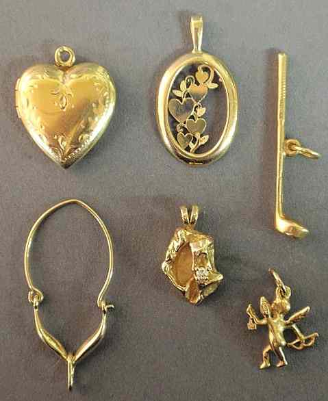 Appraisal: Group of six k gold charms- heart golf club wishbone