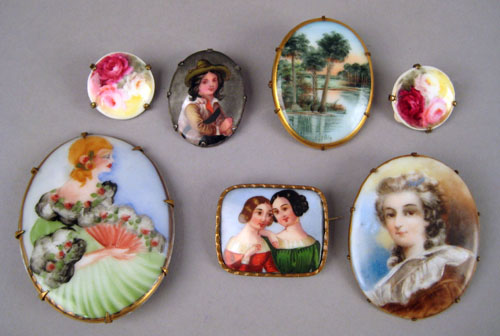 Appraisal: Group of handpainted porcelain pins one with landscape scene