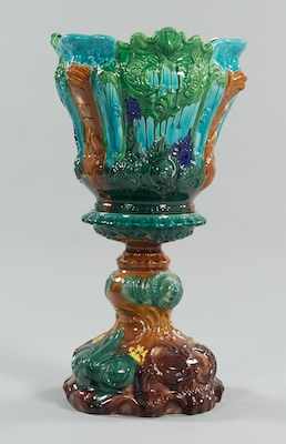 Appraisal: A Large Italian Majolica Jardineire on Pedestal Elaborately molded jardineire