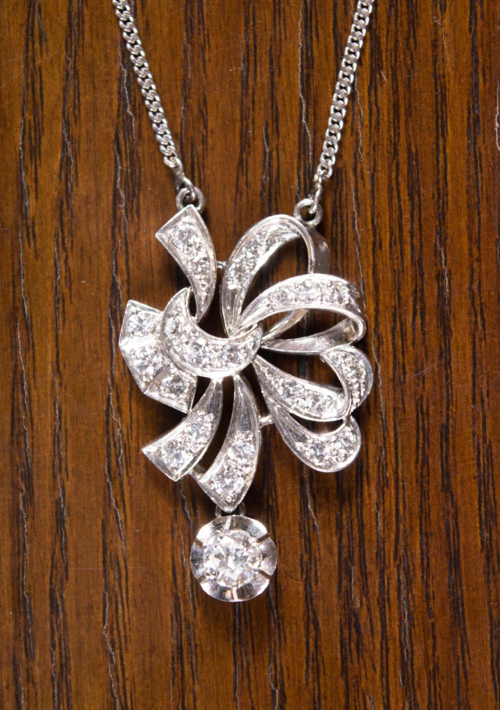 Appraisal: DIAMOND AND FOURTEEN KARAT WHITE GOLD NECKLACE with two lengths