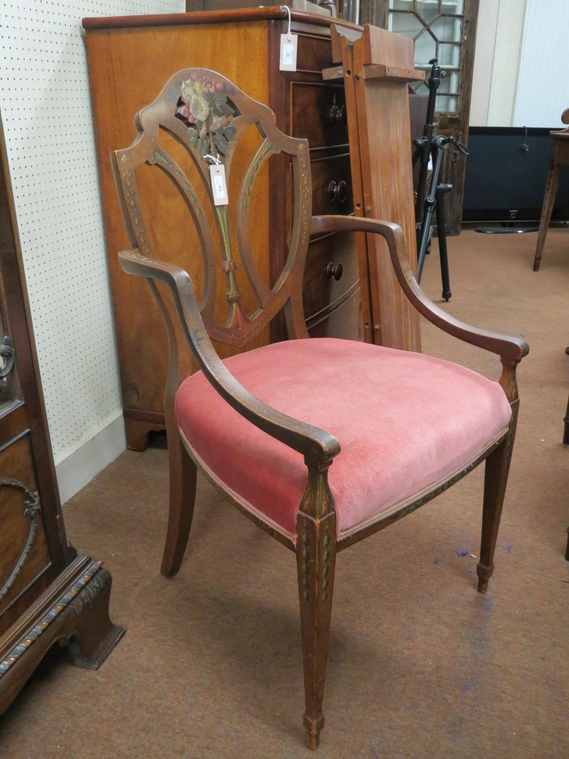 Appraisal: An Edwardian Hepplewhite elbow chair shield-shape back and upholstered seat