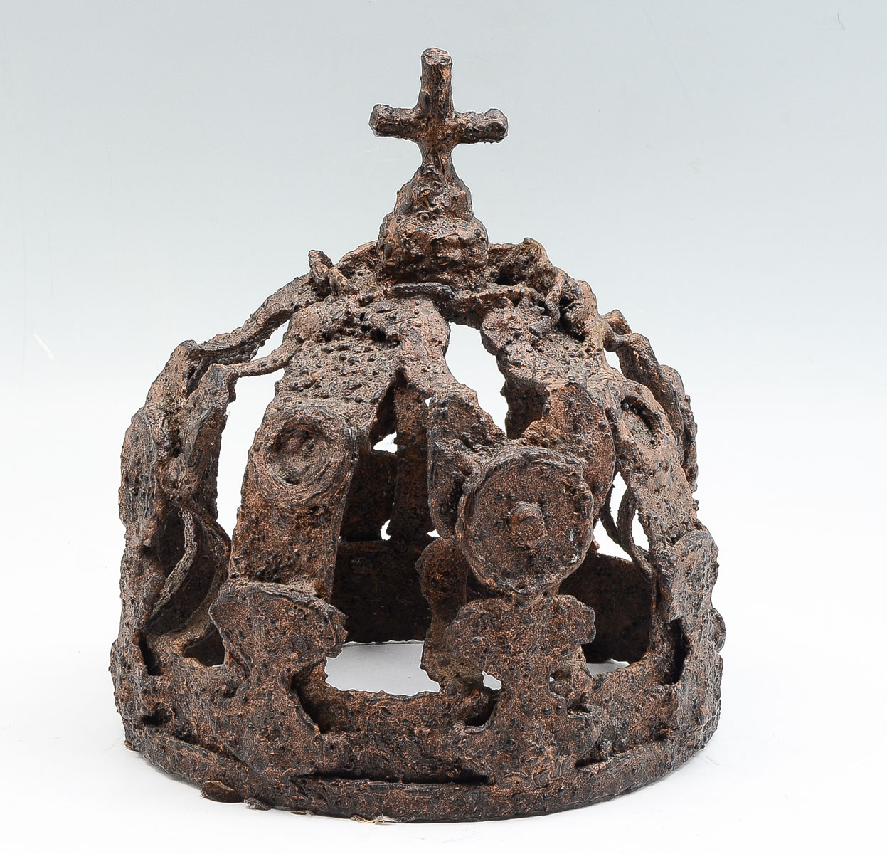 Appraisal: CAST IRON CROWN W CROSS ORNAMENT Cast iron brutalist crown