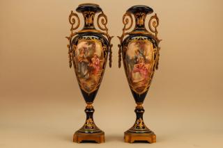 Appraisal: Antique Pair of Gilt French Sevres Porcelain Urns with bronze