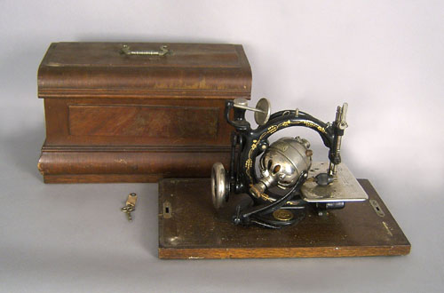 Appraisal: Wilcox Gibbs electric sewing machine h early th c with