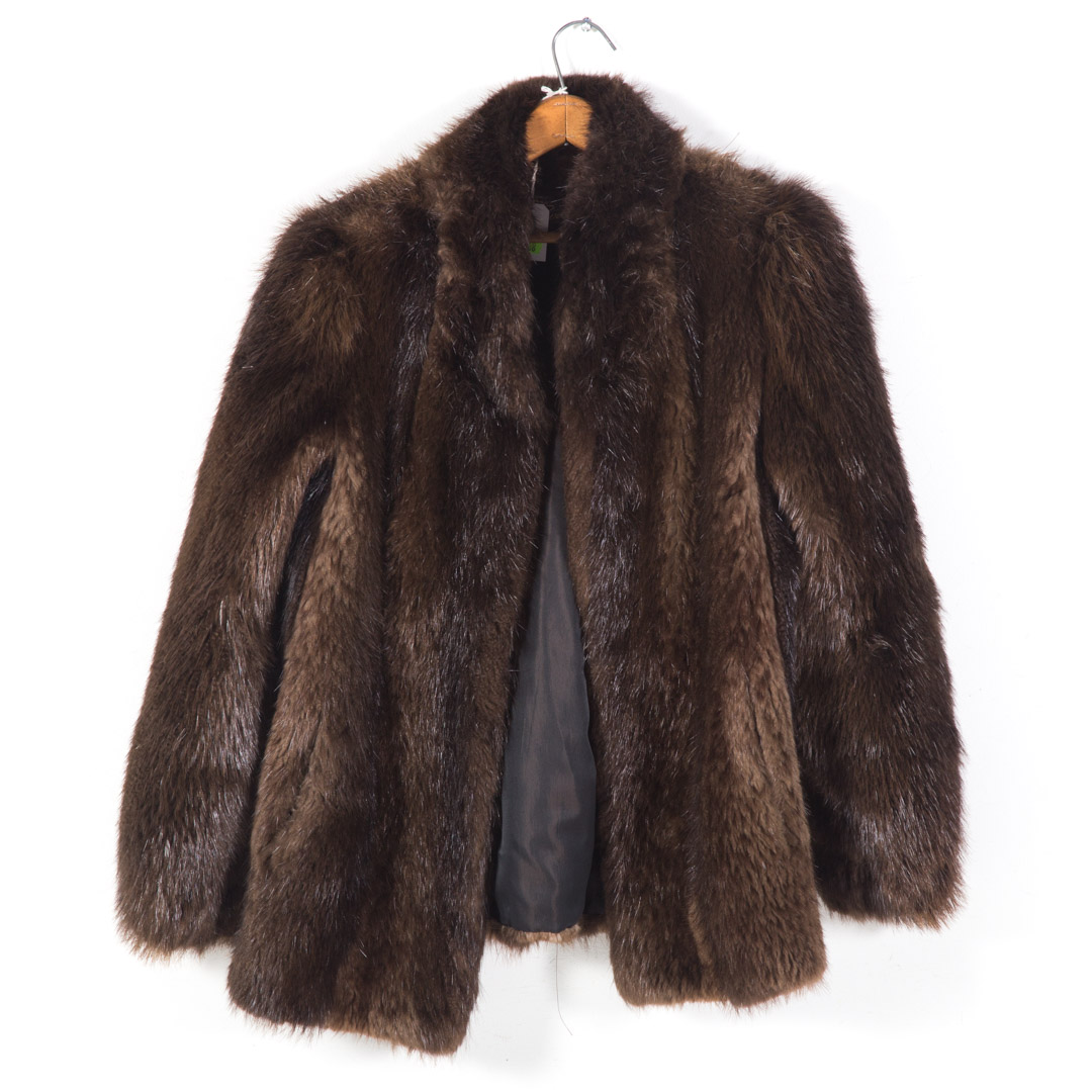 Appraisal: A Lady's Fur Jacket from Mano Swartz Dark brown jacket